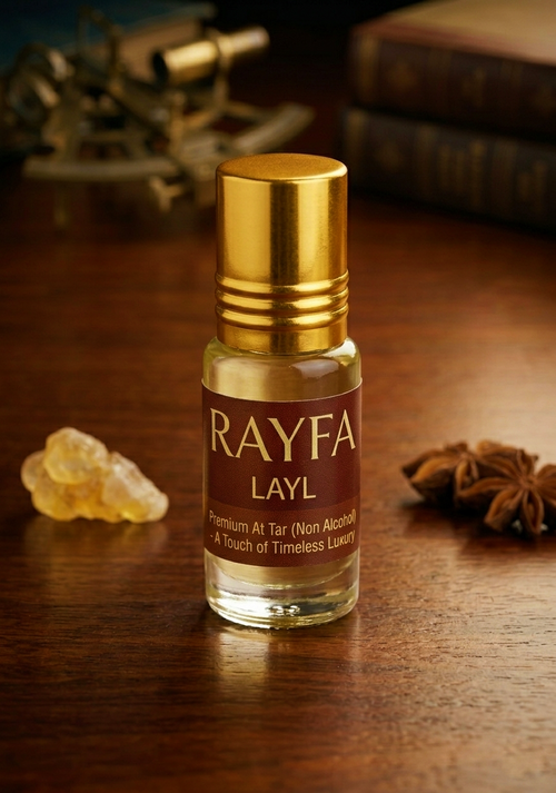 RAYFA layal atar bottle with gold cap and amber glass base