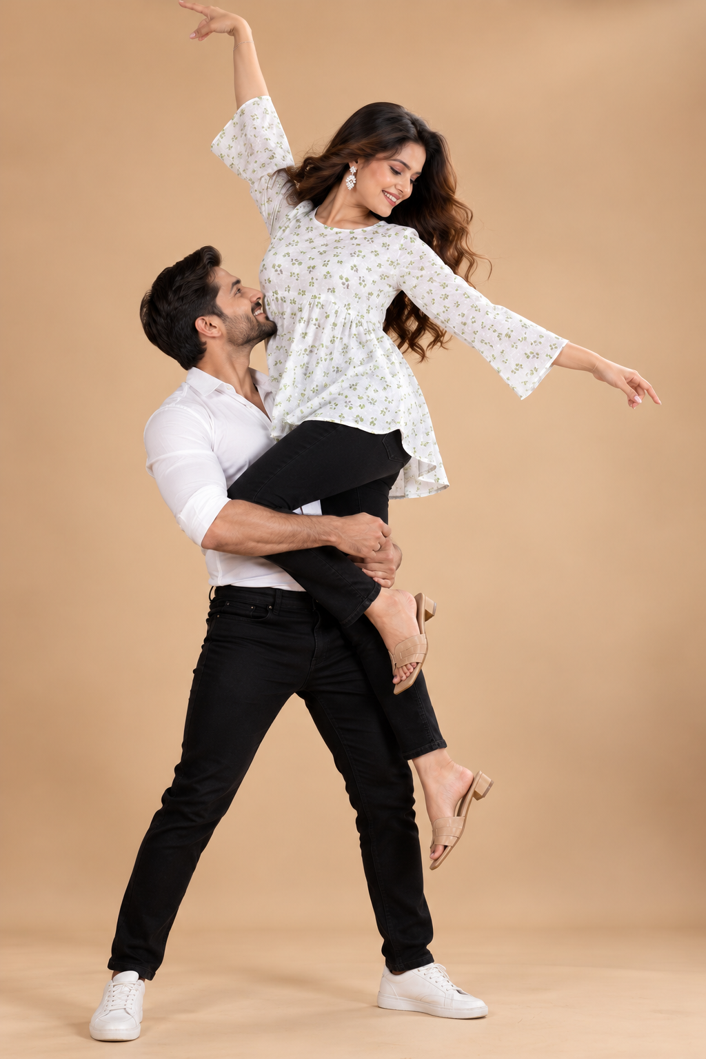 White and green floral short kurti with flared sleeves, styled with fitted pants